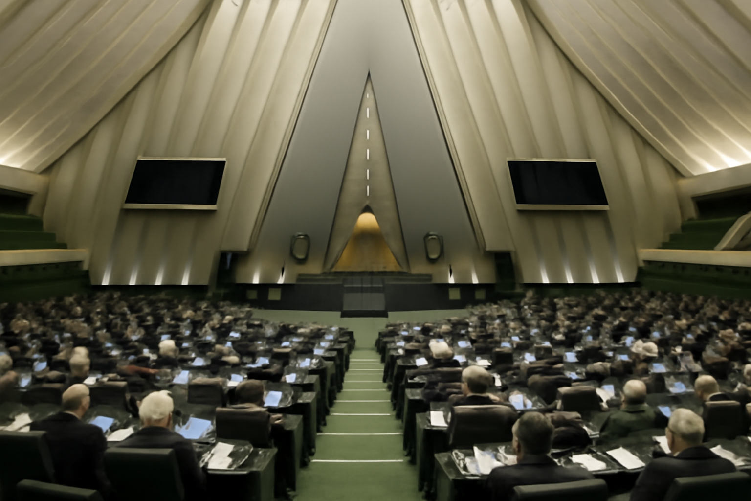 Interior of Iran's parliament chamber in Tehran during a formal legislative session