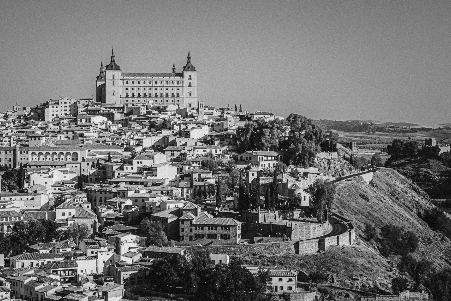 Derailed high-speed train carriages lying on their sides in the Spanish countryside near Toledo