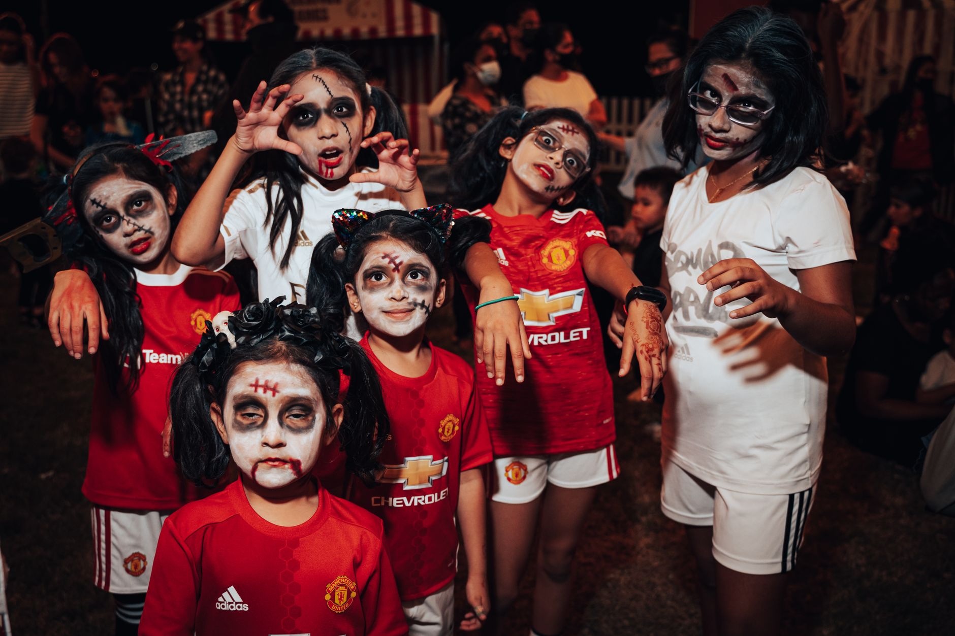 Empty Old Trafford stands with Manchester United branding after a home defeat