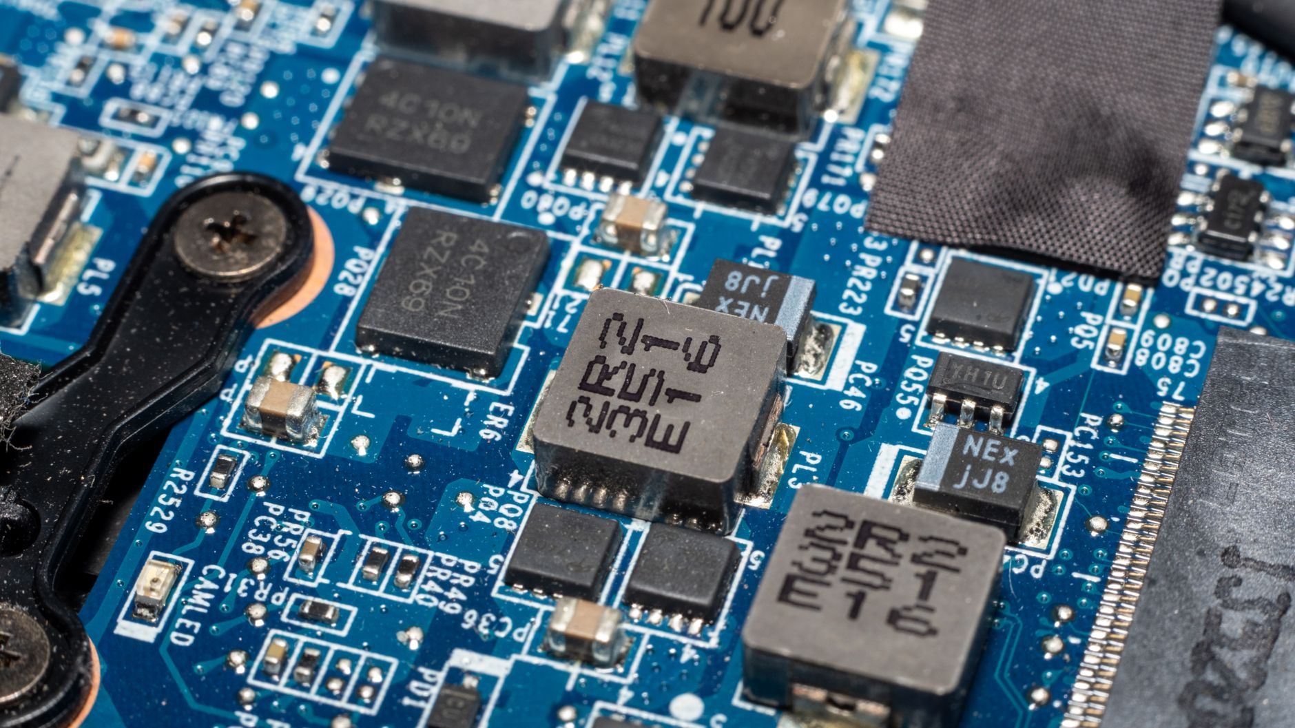 Server rack with motherboard circuitry glowing during a firmware boot sequence
