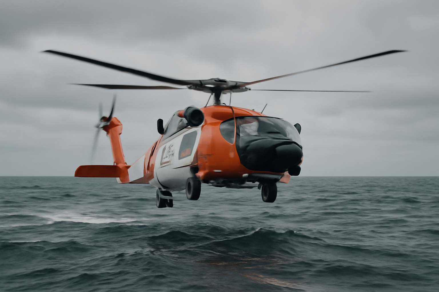 A US Coast Guard search-and-rescue helicopter flying low over open ocean water during daylight