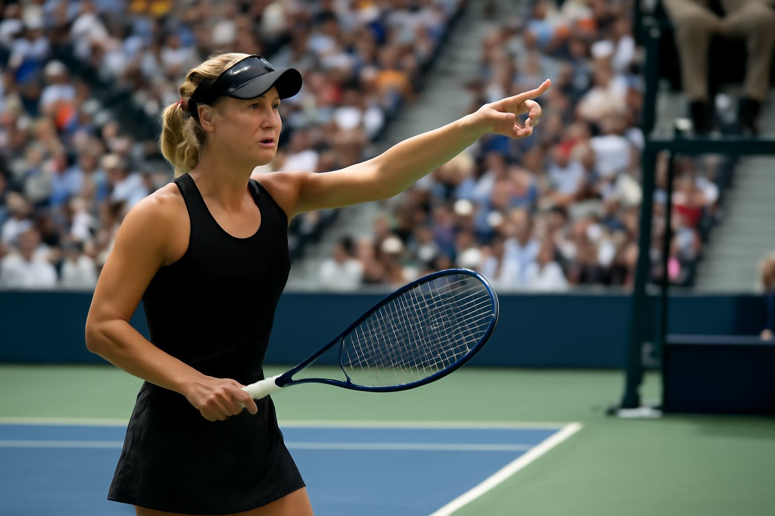 Tennis player in white and teal outfit reacting during a match on an outdoor hard court