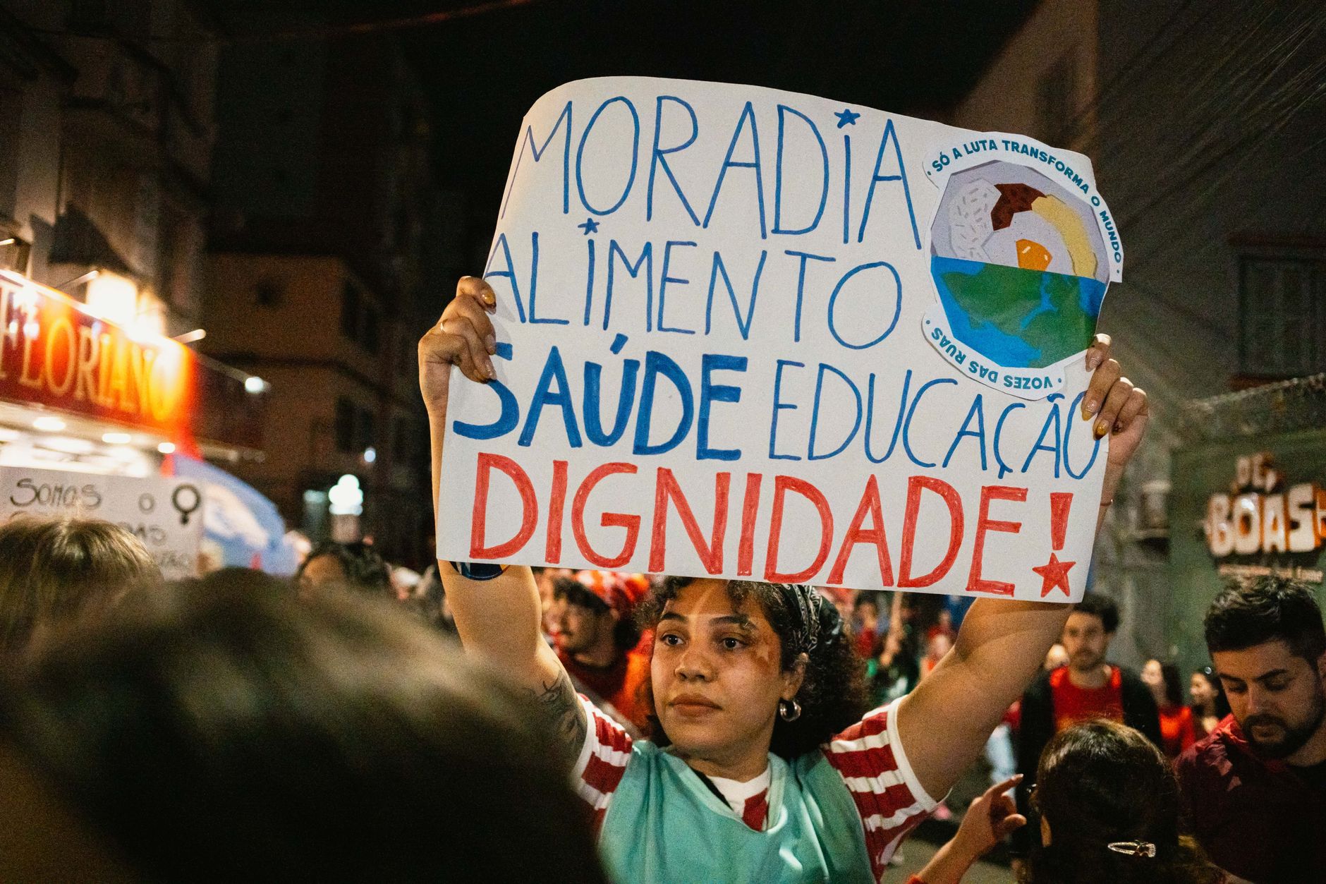 Supporters celebrate outside a São Paulo conference hall after Brazil's presidential runoff results are announced
