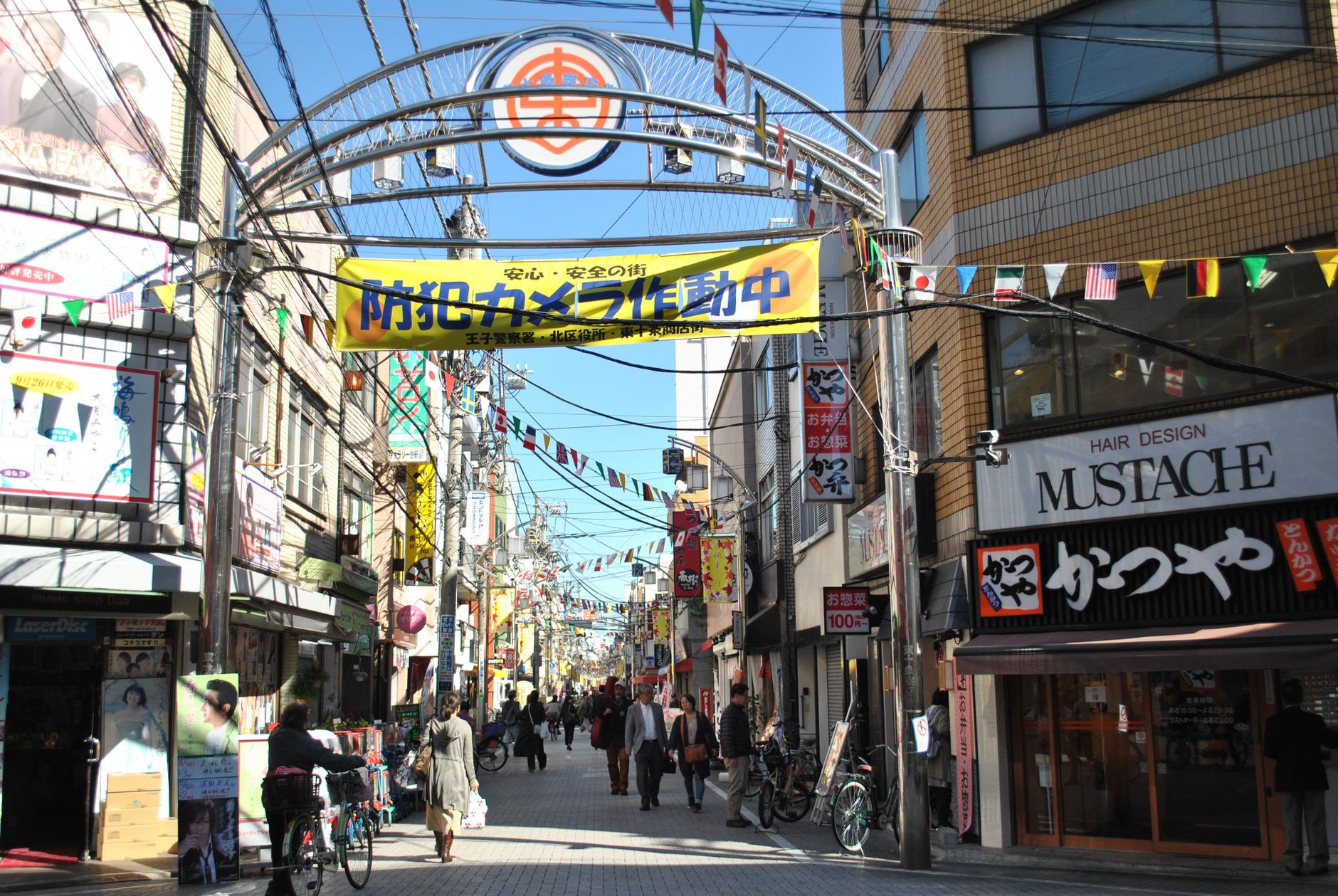 Call of Duty game box art displayed near a Seoul memorial candle vigil setting