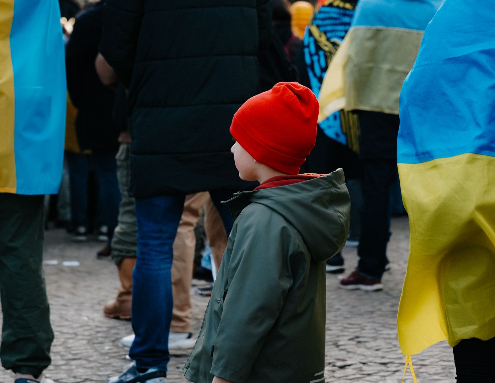 Ukrainian and Dutch flags displayed together outside a government building in The Hague