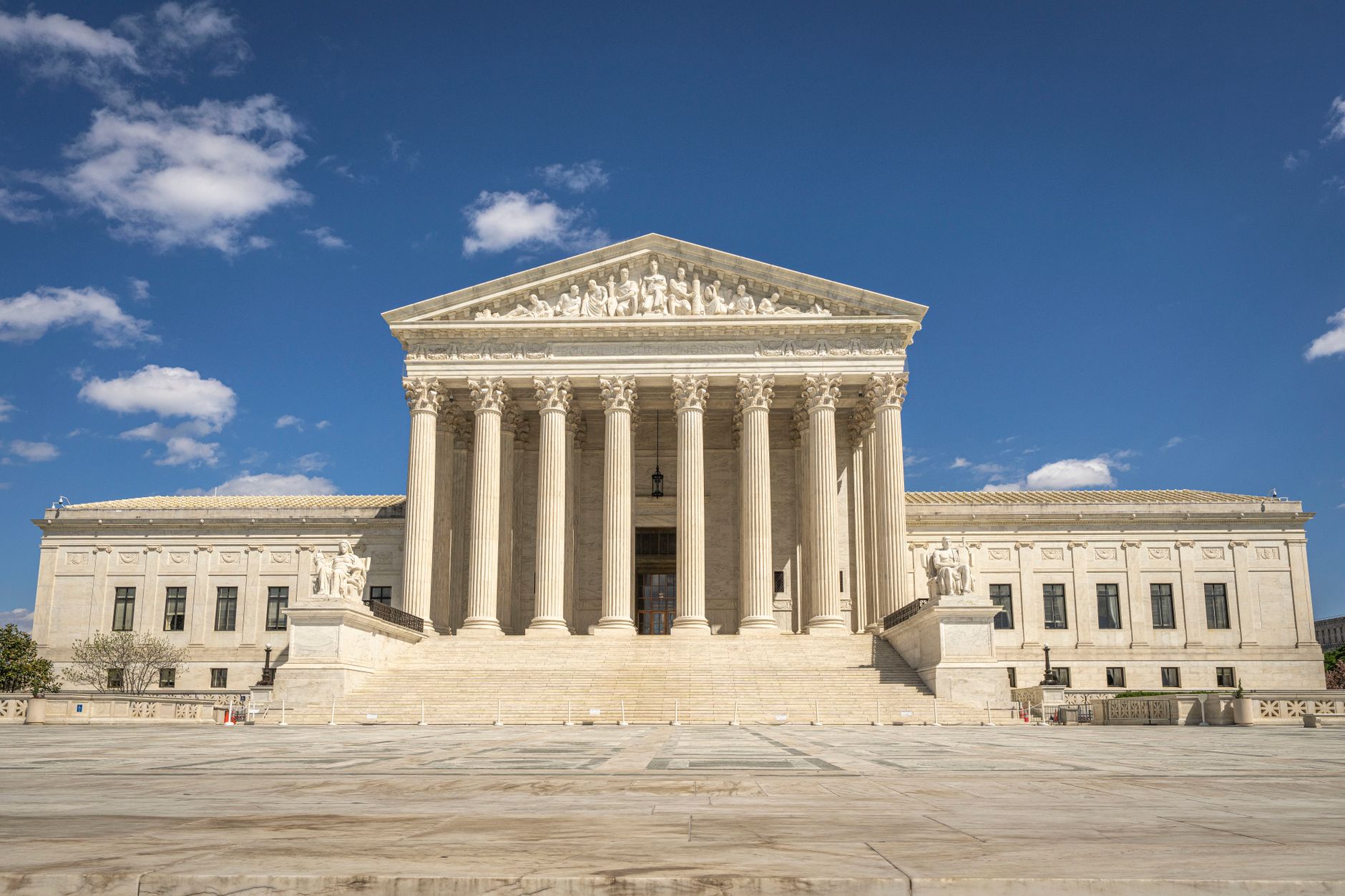 Exterior of the U.S. Supreme Court building under daytime sky
