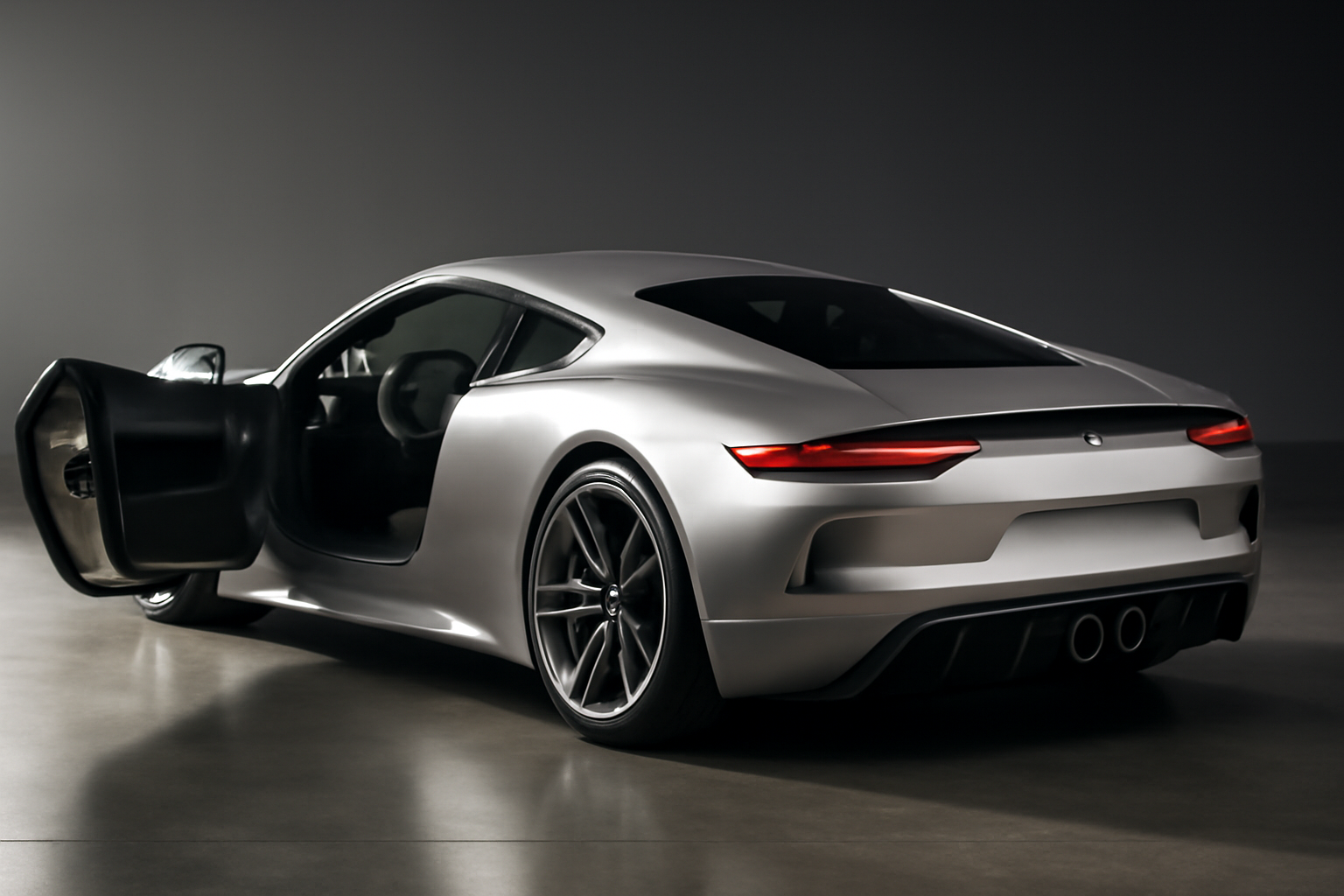 Mid-engined Porsche Mission S concept car on display with quad exhaust outlets visible