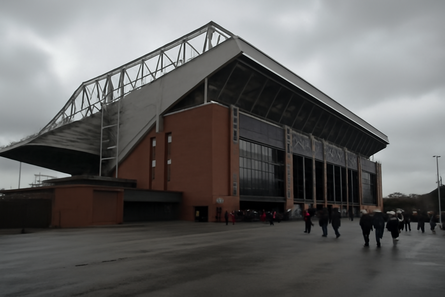 Manchester City's Etihad Stadium exterior under a cloudy sky