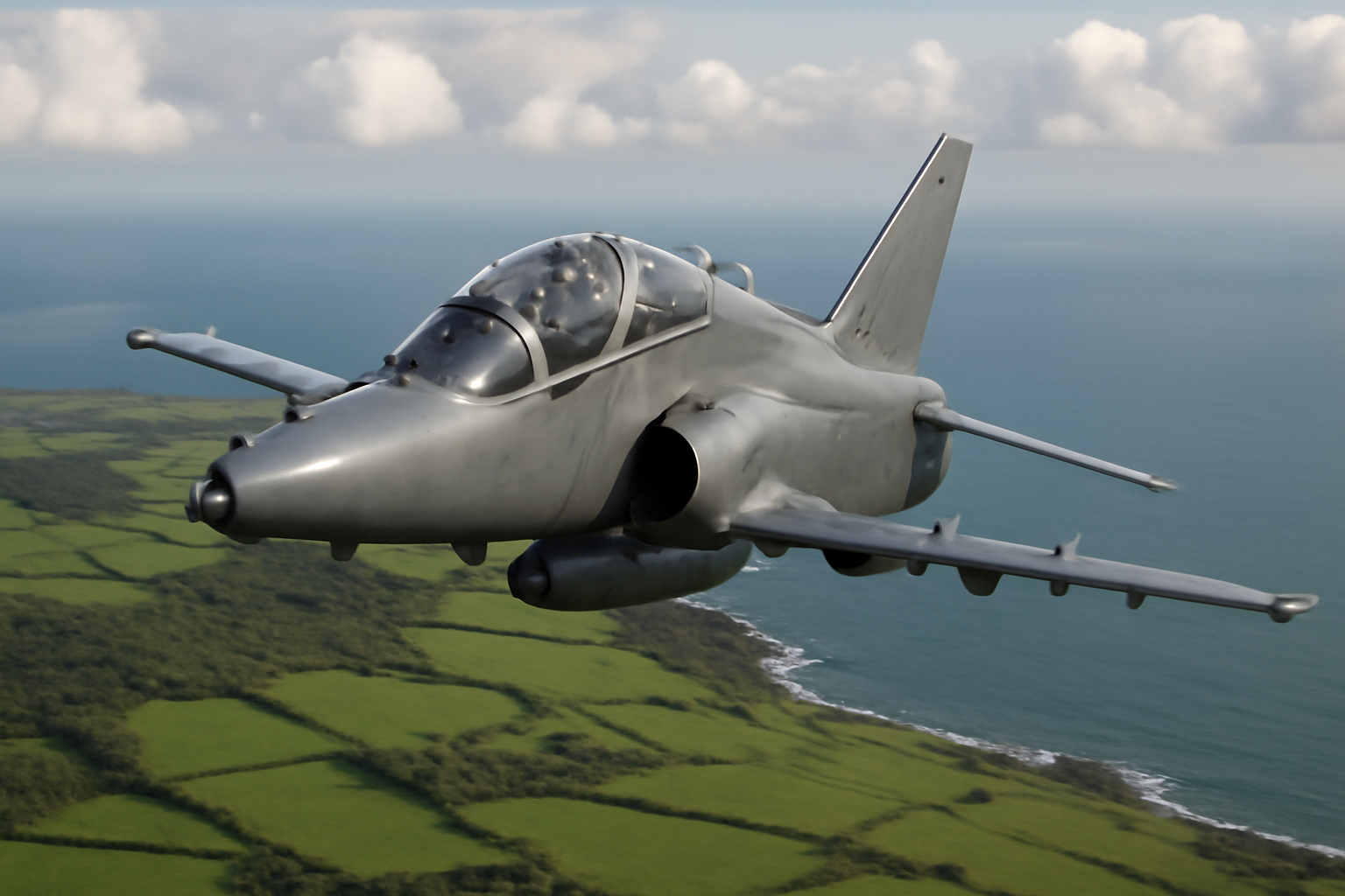 RAF Hawk T2 jet trainer aircraft in flight over a coastal landscape resembling Anglesey