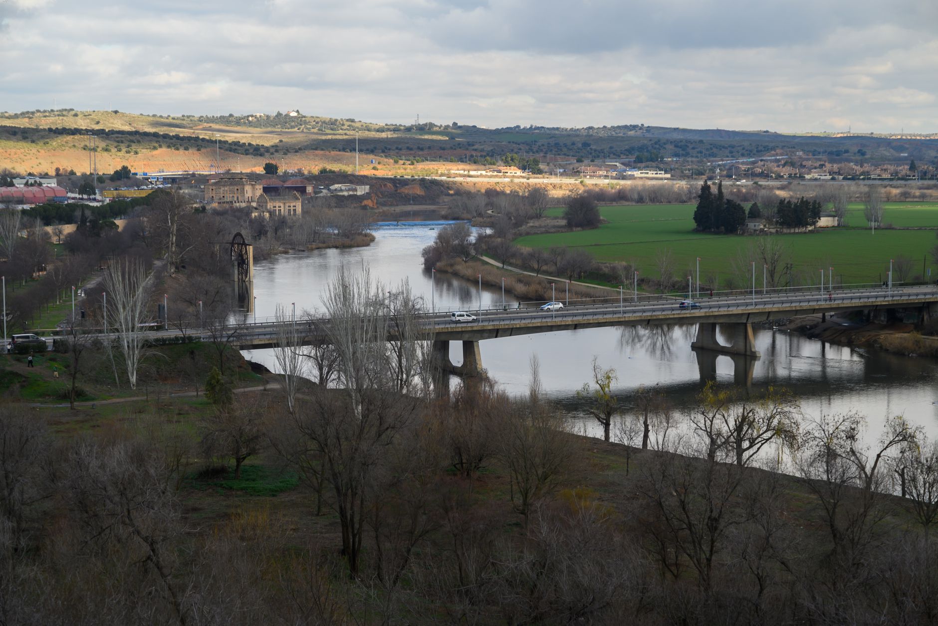 Emergency crews work near derailed high-speed train cars on tracks outside Toledo, Spain