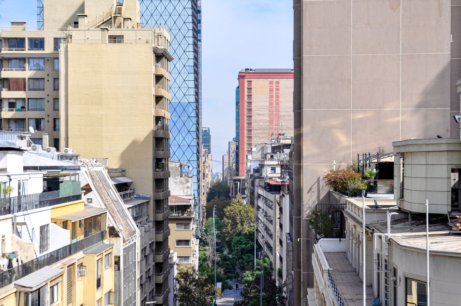 Exterior of a modern central bank building in downtown Santiago under overcast skies